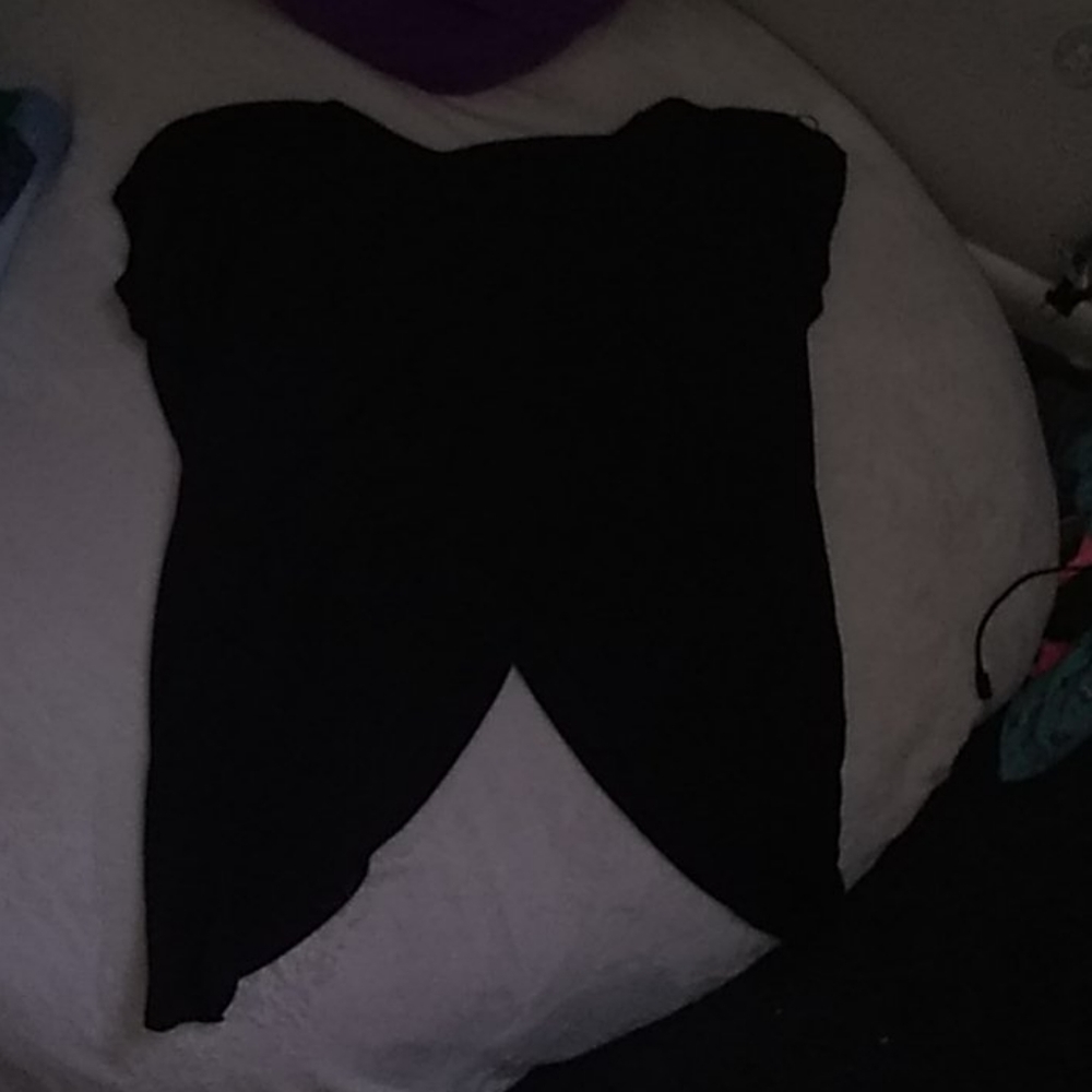 Shirt shows belly button